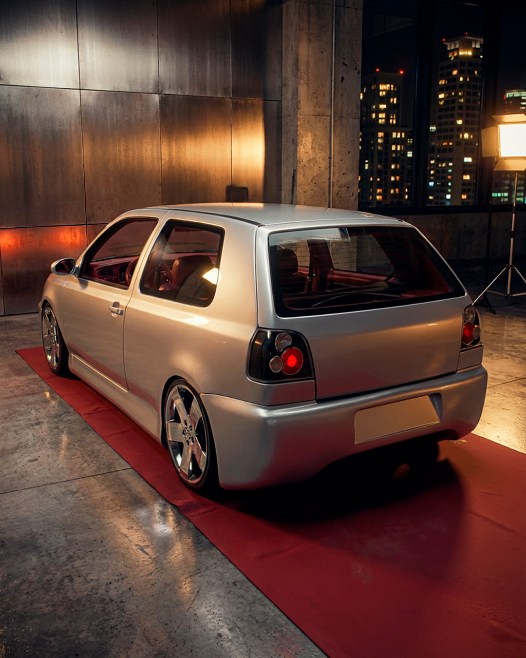 Golf III tuning minimalista, vista trasera en set nocturno, llantas cromadas