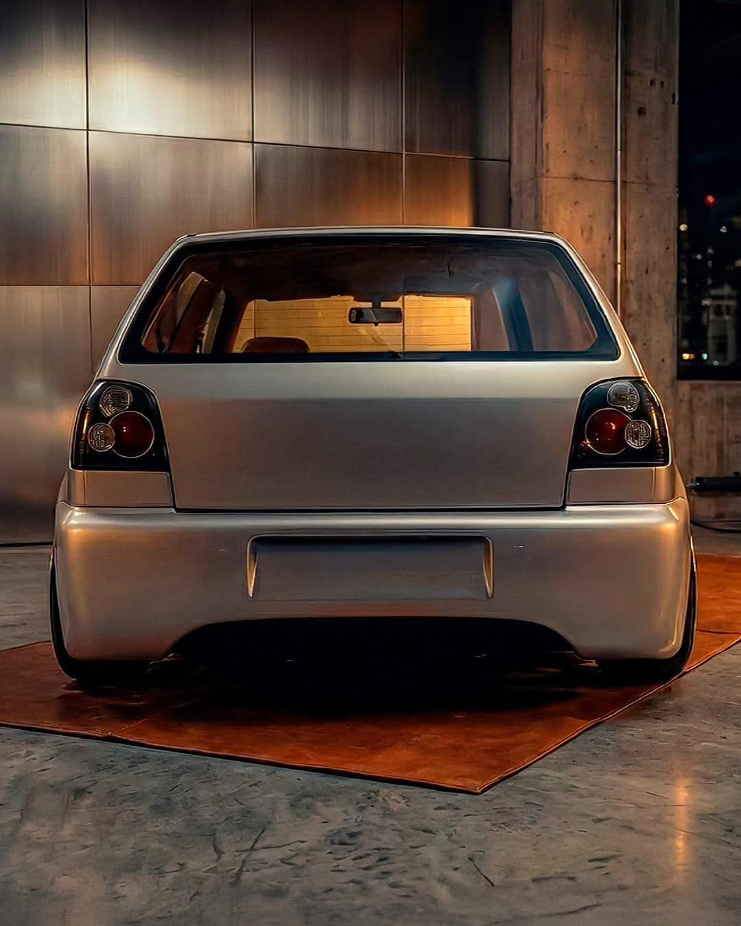 Volkswagen Golf III alisado artesanal, trasera baja, acabados integrados